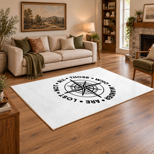 white wander compass hiking quote area rug, angled room view