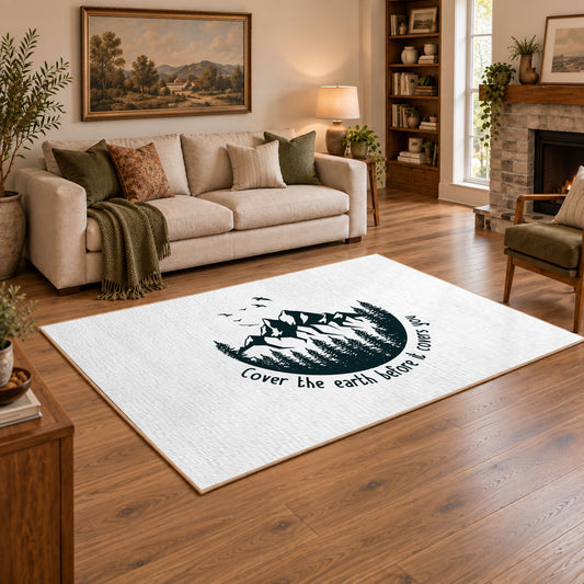 white cover the earth mountain quote area rug, angled room view