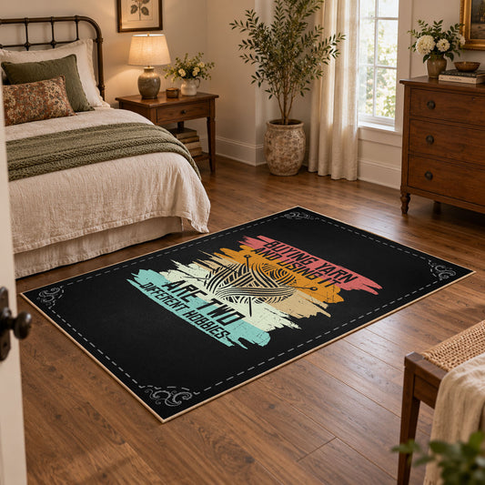 Knitting yarn quote area rug in black with coral, teal, yellow, and cream accents, featured room view