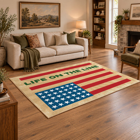 American flag tribute area rug in beige, red, blue, and cream, angled room view