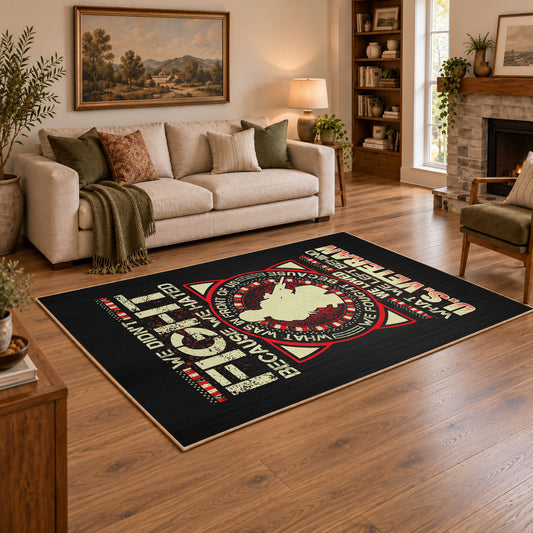 Military service emblem area rug in black, red, cream, and gold, angled room view
