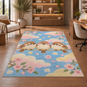 Cute Birds Nursery Rug in a home office with wooden shelves