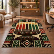 Mudcloth Kwanzaa Rug in a home office with wooden shelves