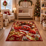 A friendly red furry monster wearing a Santa hat reaches through a glowing spiral of presents; rug shown in a festive nursery