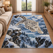 Leaping Snow Leopard Rug in a bright living room with a sofa