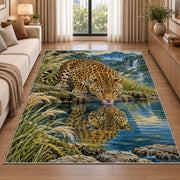 Leopard Drinking at Lake Rug in a bright living room with a sofa