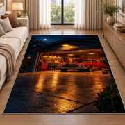 Garage at night with a muscle car rug in a bright living room with a sofa