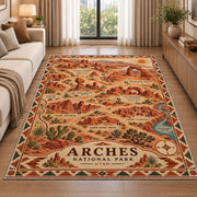 Illustrated Arches National Park map rug in a living room beside a sofa