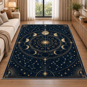 Navy and gold celestial zodiac wheel rug in a living room beside a sofa