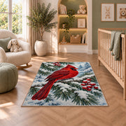 Cardinal on Snowy Branch Rug in a nursery with a crib and armchair