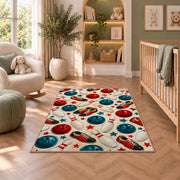 Bowling Pattern Rug in a nursery with a crib and armchair