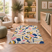 Volleyball Gear Pattern Rug in a nursery with a crib and armchair