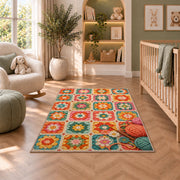 Granny Square Rug in a nursery with a crib and armchair