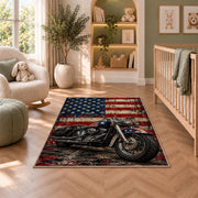 Motorcycle and American Flag Rug in a nursery with a crib and armchair