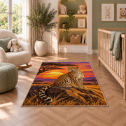 Leopard at Savanna Sunset Rug in a nursery with a crib and armchair