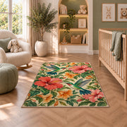 Hummingbirds and Hibiscus Rug in a nursery with a crib and armchair