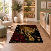 Leopard on Black with Roses Rug in a nursery with a crib and armchair