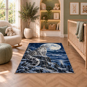 Snow Leopard Under Full Moon Rug in a nursery with a crib and armchair