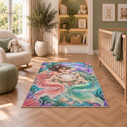 Three Mermaids and Shell Rug in a nursery with a crib and armchair