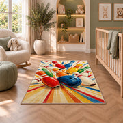 Colorful Falling Pins Rug in a nursery with a crib and armchair