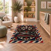 mustache and scissors barber rug in a nursery with a crib and armchair