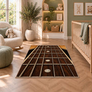 guitar fretboard rug in a nursery with a crib and armchair