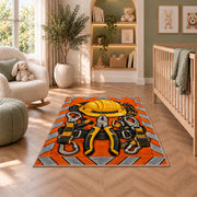 safety orange lineman rug in a nursery with a crib and armchair