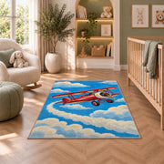 Vintage Biplane Rug in a nursery with a crib and armchair