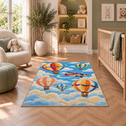 Hot Air Balloon Rug in a nursery with a crib and armchair