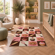 Checkered bakery icons rug in a nursery with a crib and armchair
