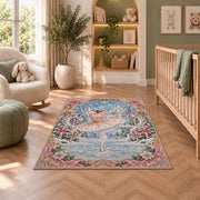 Winter ballerina rug in a nursery with a crib and armchair
