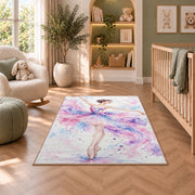 Watercolor ballerina rug in a nursery with a crib and armchair