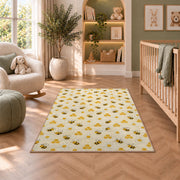 Tiny Bee Pattern Rug in a nursery with a crib and armchair