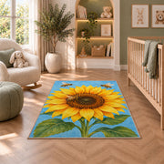 Sunflower and Bees Rug in a nursery with a crib and armchair