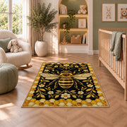 Golden Bee Honeycomb Border Rug in a nursery with a crib and armchair
