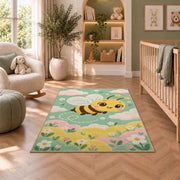 Cute Baby Bee Nursery Rug in a nursery with a crib and armchair