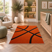 Basketball Texture Close-Up rug in a nursery with a crib and armchair