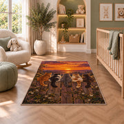 Cats on Fence at Sunset rug in a nursery with a crib and armchair