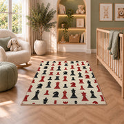 chess pieces pattern rug in a nursery with a crib and armchair