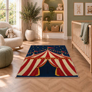Vintage Circus Tent Rug in a nursery with a crib and armchair
