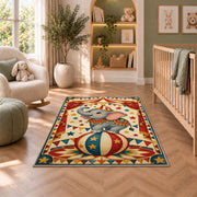 Circus Elephant Rug in a nursery with a crib and armchair