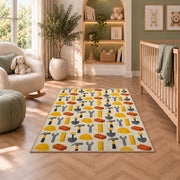Construction Tools Pattern Rug in a nursery with a crib and armchair