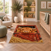 Highland Cow Barn Door Rug in a nursery with a crib and armchair