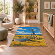 Windmill on the Prairie rug in a nursery with a crib and armchair