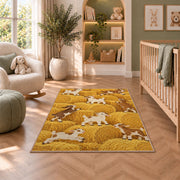Goats on Hay Bales rug in a nursery with a crib and armchair