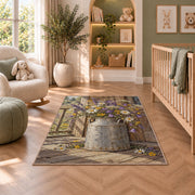 Milk Can with Wildflowers rug in a nursery with a crib and armchair