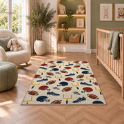 Football Gear Pattern rug in a nursery with a crib and armchair