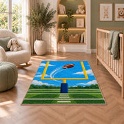 Field Goal Kick rug in a nursery with a crib and armchair