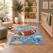 Cute Cartoon Football rug in a nursery with a crib and armchair