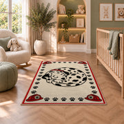 Sleeping Dalmatian rug in a nursery with a crib and armchair
